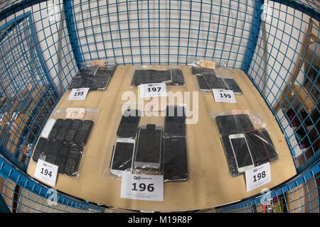 Mobile phones at an auction house in Berlin, Germany, 26 Janaury 2018. Lost property from the Zentrales Fundbuero (central lost property office) is to go under the hammer at the Assetorb auction house in Berlin. Photo: Paul Zinken/dpa