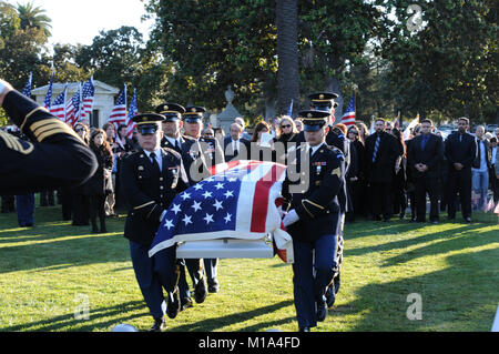 111203-Z-WM549-003  The California Army National Guard's Honor Guard carry Spc. Sean Michael Walsh to his final resting site Dec. 3 at the Oak Hill Cemetery, San Jose, Calif. Walsh, a member of the California Army National Guard's 870th Military Police Company, died Nov. 16 in Afghanistan, becoming the 29th California Guardsman to perish on behalf of Operation Enduring Freedom. He is the California Army National Guard's second casualty in less than a month. (Army National Guard photo/Spc. Eddie Siguenza) Stock Photo