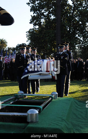 111203-Z-WM549-012  The California Army National Guard Honor Guard carries Spc. Sean Michael Walsh to his final resting site Dec. 3 at the Oak Hill Cemetery, San Jose, Calif. Walsh, a member of the California Army National Guard's 870th Military Police Company, died Nov. 16 in Afghanistan, becoming the 29th California Guardsman to perish on behalf of the attacks of 9/11. He is the California Army National Guard's second casualty in less than a month. (Army National Guard photo/Spc. Eddie Siguenza) Stock Photo