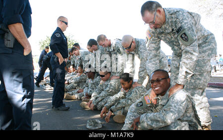 Defensive Riot Formations Military personnel conduct riot control training exercises to practice ...
