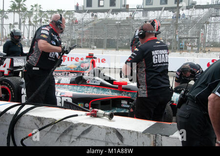 Panther Racing and JR Hildebrand host Operation Hire our Guard during the Grand Prix of Long Beach, April 21, 2013. Employers were invited to hear “The Road Map to Help” presentation to help end unemployment amongst National Guard Soldiers and their r spouses. Maj. Gen. David S. Baldwin, the Adjutant General, California Military Department, attended the program to help educate employers on the need to keep our Citizen Soldiers employed in California. Check out www.roadmaptohelp.com ( http://www.roadmaptohelp.com )  for more information. (Air National Guard photo/Master Sgt. Julie Avey) Stock Photo