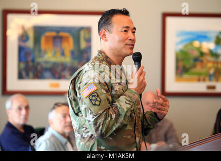 U.S. Army Col. Julian H. Bond, Commander, Joint Forces Training Base Los Alamitos, delivers welcoming remarks at The Pub at Fiddlers Green, Nov. 16, 2017, during the base's 14th annual Thanksgiving Appreciation Lunch. Local elected officials and community leaders joined California National Guard Soldiers, Airmen and family members of deployed troops at the event. (Air National Guard photo by Senior Airman Crystal Housman) Stock Photo