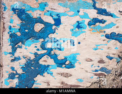 Grunge texture, several layers of paint peeling from wooden boards of a boat hull Stock Photo