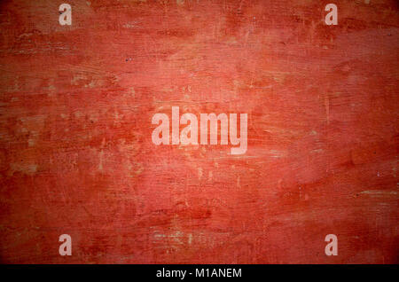 Close-up of red, textured surface of the wall Stock Photo