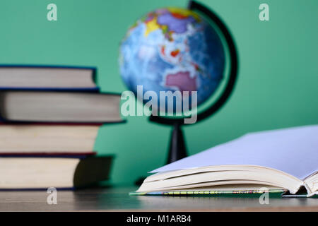 The concept of education books and other objects on the table Stock Photo