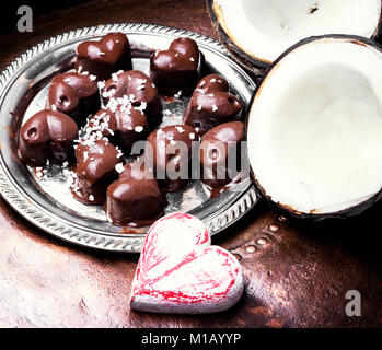 chocolate candy with coconut in the form of a heart Stock Photo