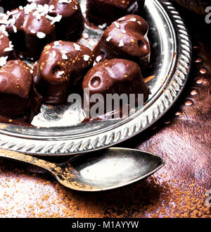 chocolate candy with coconut in the form heart Stock Photo