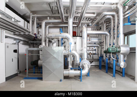 central heating and cooling system control in a boiler room Stock Photo