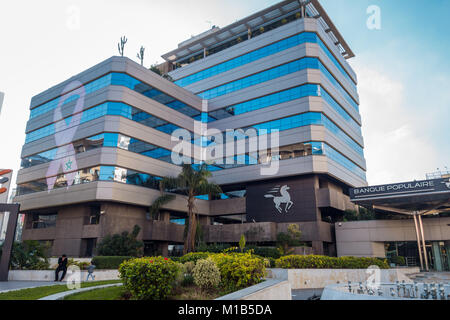 Casablanca, Morocco - 21 January 2018 : low angle view of banque populaire building against sky Stock Photo