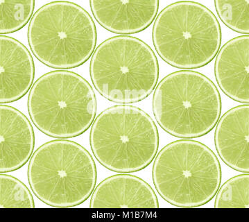 Citrus fruit pattern. Seamless background with slices of fresh lime fruits isolated on white background Stock Photo