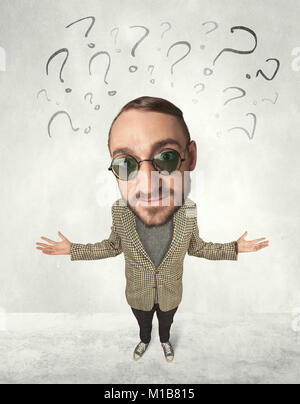 Funny person with big head and drawn question marks over it Stock Photo