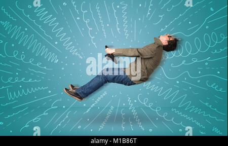 Funny guy drives an imaginary vehicle with drawn lines around him concept Stock Photo