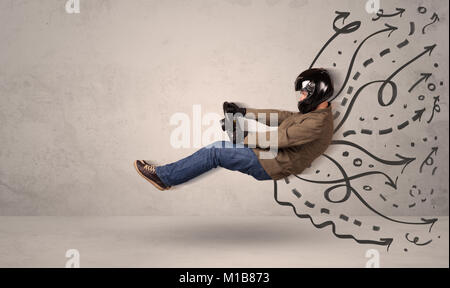 Funny man driving a flying vehicle with hand drawn lines after him concept Stock Photo