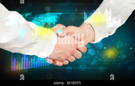 Handshake with charts and diagrams background Stock Photo
