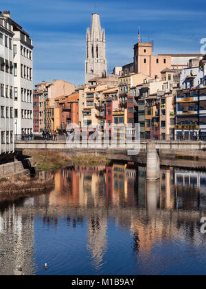 Houses on the Onyar and Church of Saint Felix in Girona, Catalonia. Stock Photo