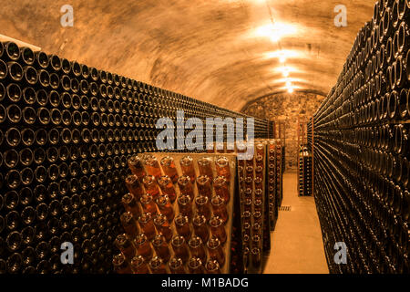 Hautvillers, France - August 11, 2017: Champagne caves and cellars with champagne bottles in Hautvillers near Reims and Epernay. Stock Photo