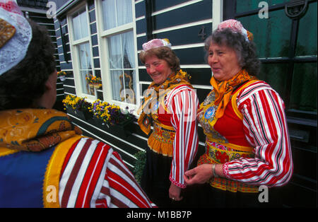 The Netherlands. Marken. Annual festival on 27 april called Kingsday. People of Marken in traditional costume. Stock Photo