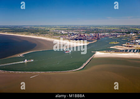 The Netherlands, IJmuiden, Aerial view of entrance and locks of North Sea Canal. Background Tata steel factory. Stock Photo