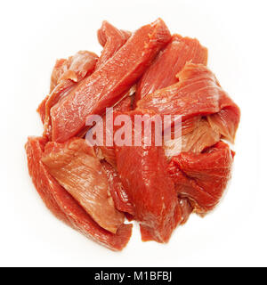 Meat of veal which is sliced in pieces on a white background Stock Photo