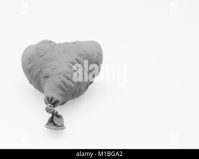 Deflate heart shape balloon in black and white isolated on white background Stock Photo