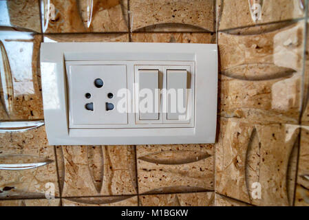 Beige rocker light switch with two buttons Stock Photo
