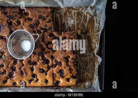 Homemade cherry pie on dark wooden table Stock Photo