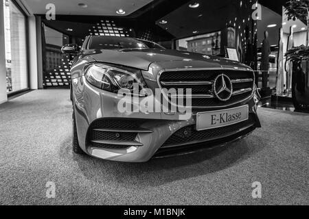 STRASBOURG, FRANCE - SEP 21, 2014: White Mercedes-Benz E Class taxi parked  on a rainy day in center of Strasbourg, place Kleber next to cafe Stock  Photo - Alamy