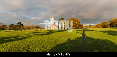 Winter sun just before sunset falling on the Chapel at the old military hospital site of Netley now known as Royal Victoria country park in Hampshire Stock Photo
