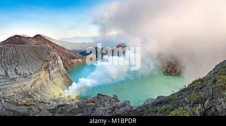 Volcano Kawah Ijen, volcanic crater with crater lake and steaming vents, morning light, Banyuwangi, Sempol, Jawa Timur Stock Photo