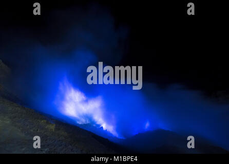 Vulcano Kawah Ijen, blue fire in volcano crater, volcanic complex Ijen, Eastern Java, Java, Indonesia Stock Photo