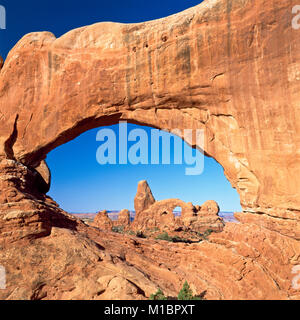 turret arch viewed through north window in arches national park near moab, utah Stock Photo
