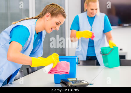 Cleaning ladies working in office Stock Photo
