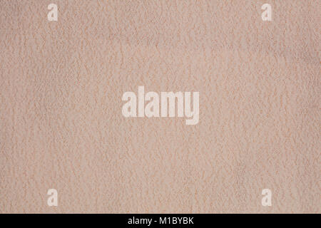 light pink color fabric with folds, closeup, background Stock Photo