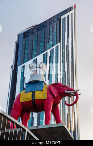 LONDON, UK - NOVEMBER 03, 2012:  The statue depicting the name Elephant & Castle next to the London Tube station entrance with Strata SE1 building in  Stock Photo