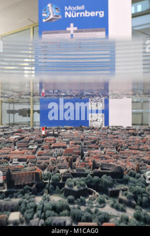 Nuremberg, Germany. 29th Jan, 2018. A 3D printed city model of Nuremberg is part of the exhibition 'Analog bis Digital. Der Freistaat in Karten' at the Homeland Ministry in Nuremberg, Germany, 29 January 2018. The exhibition will trace the beginnings of Bavaria through cartography. Interested guests can visit it until the 16th of February 2018. Credit: Daniel Karmann/dpa/Alamy Live News Stock Photo