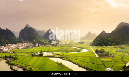 Stunning rice fields and karst formations scenery in Guangxi province of China Stock Photo