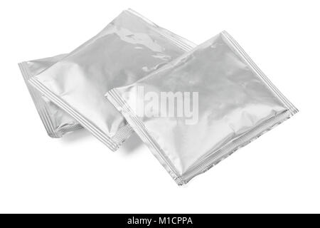 Three Sealed Aluminum Sachets Lying on White Background Stock Photo