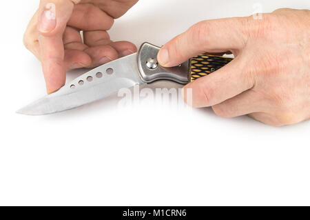 Pocket folding knife on the white background Stock Photo