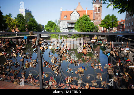 Padlocks on Bridge of Love (Most Milosci) in city of Gdansk, Poland Stock Photo