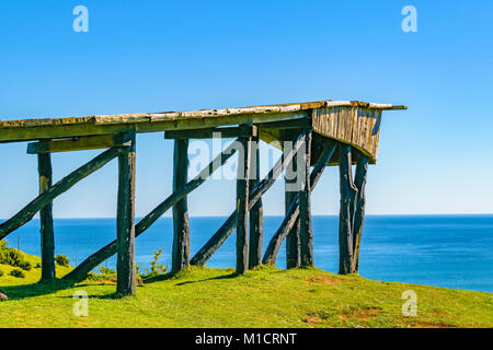 Empty famous wooden viewpoint in front of precipice at Chiloe island, Chile Stock Photo