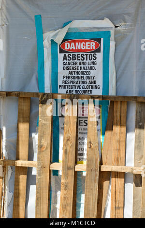 A warning / danger sign at an asbestos abatement site in downtown Las Vegas, Nevada. Stock Photo