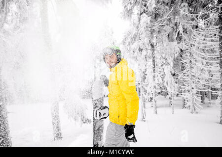 Snowboarder in the forest Stock Photo