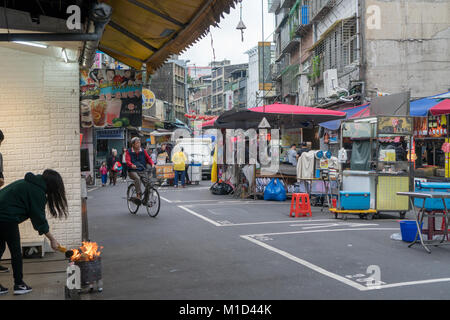 Setting up the market and burning joss paper, Taipei, Taiwan Stock Photo