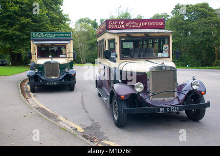 A pair of vintage coaches offering guided tours on the Ring of Kerry, Ireland - John Gollop Stock Photo