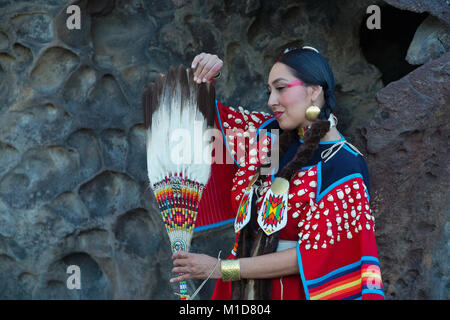 Willow Abrahamson poses along a basalt cliff at Twin Falls State Park in Idaho. model release yes. Stock Photo