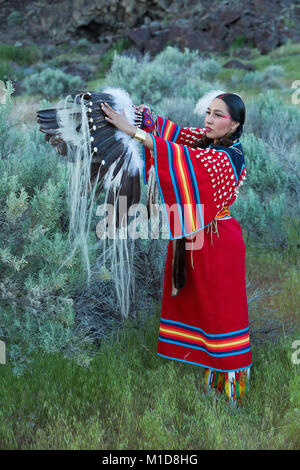 Willow Abrahamson poses in sage at Twin Falls State Park in Idaho. model release yes. Stock Photo