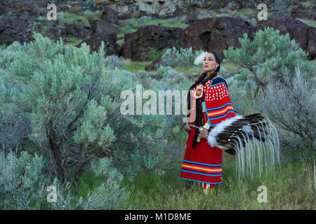 Willow Abrahamson poses in sage at Twin Falls State Park in Idaho. model release yes. Stock Photo