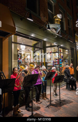 high school brass band playing in street Portsmouth NH Stock Photo