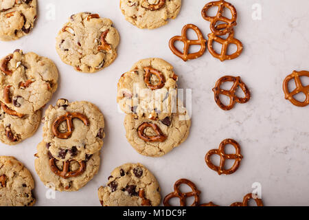 Chocolate chips and pretzels cookies on a marble table Stock Photo