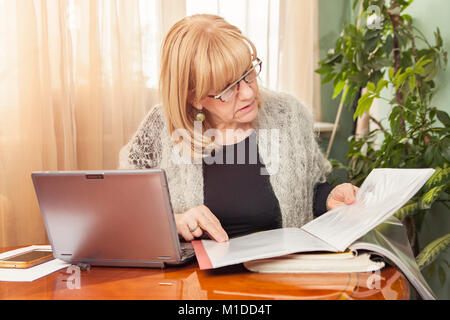 Reviewing documents and reports Stock Photo